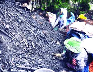 Charcoal kilns help lepers torch prejudice